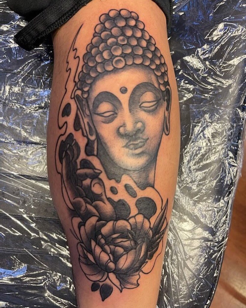 Custom black and grey Buddha tattoo by Bobby Rotten